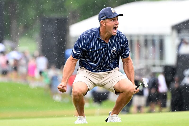 Bryson DeChambeau celebrates his birdie putt on the 18th hole with a record 58 to win the LIV Golf Invitational - Greenbrier at The Old White Course in August 2023 in White Sulphur Springs, West Virginia. Photograph: Eakin Howard/Getty Images