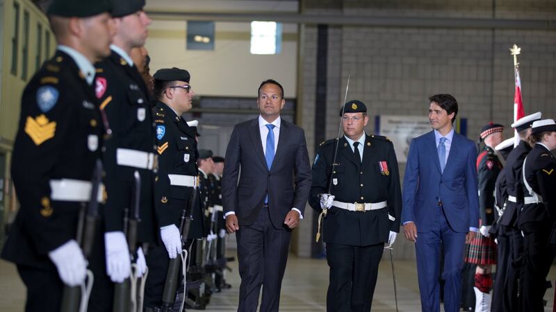Taoiseach Leo Varadkar and Canada’s prime minister, Justin Trudeau, inspect a guard of honour at the Royal Highland Regiment Armoury in Montreal. Photograph: Christinne Muschi/Reuters