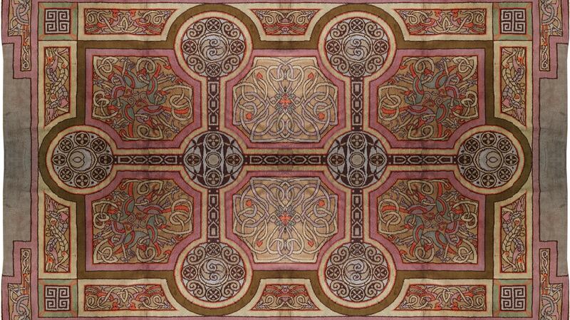 The 20th century Donegal carpet based on a design inspired by Book of Kells imagery