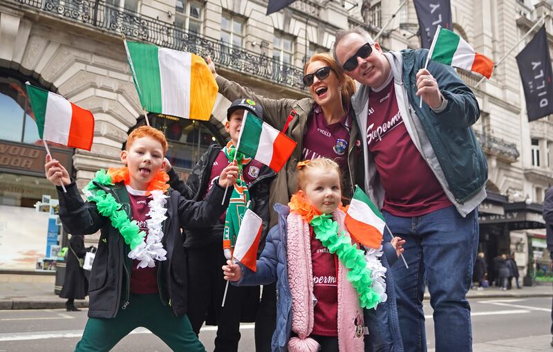 Children wait to watch the St Patrick's Day festival and parade in central London. Photograph: James Manning/PA