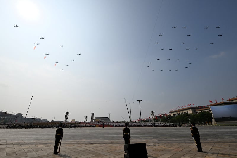 Helicopters fly to form the number 80 during a military parade marking the 80th anniversary of victory over Japan and the end of the second World War, in Beijing's Tiananmen Square. Photograph: Greg Baker/ AFP