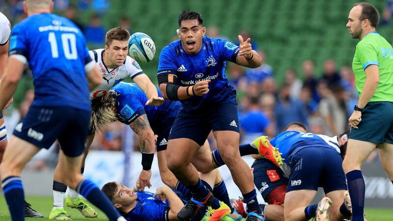 Michael Ala’alatoa passes to Johnny Sexton during the game against the Bulls. Photograph: Billy Stickland/Inpho