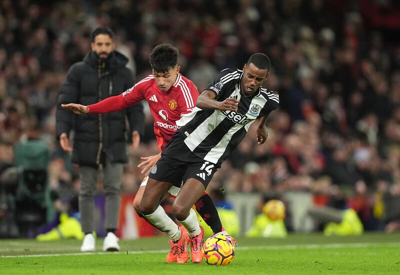 Newcastle United's Alexander Isak in action against Manchester United's Lisandro Martinez. Photograph: Martin Rickett/PA