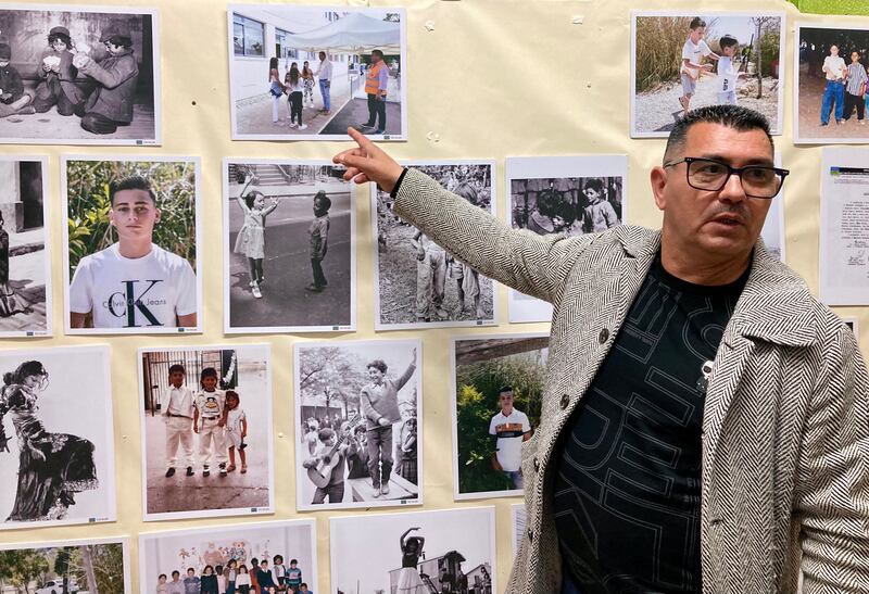 José Fernandes in front of an exhibition of photos on Roma at the Mário de Sá Carneiro school. Photograph: Aisling Redden