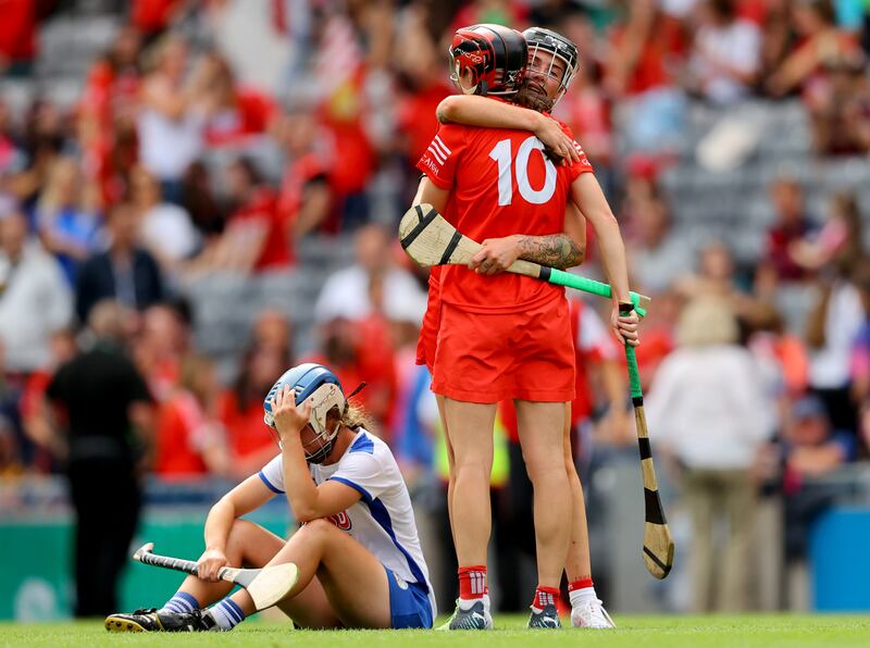 Cork’s Ashling Thompson and Katrina Mackey celebrate their win over Waterford. Photograph: James Crombie/Inpho
