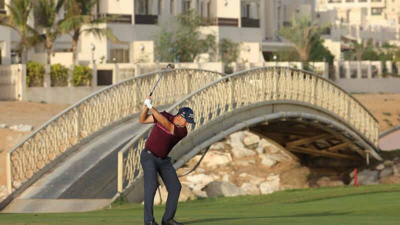 Pádraig Harrington  hits his second shot on the 10th hole during day one of the Ras al Khaimah Championship  at Al Hamra Golf Club in the  United Arab Emirates. Photograph:Andrew Redington/Getty Images
