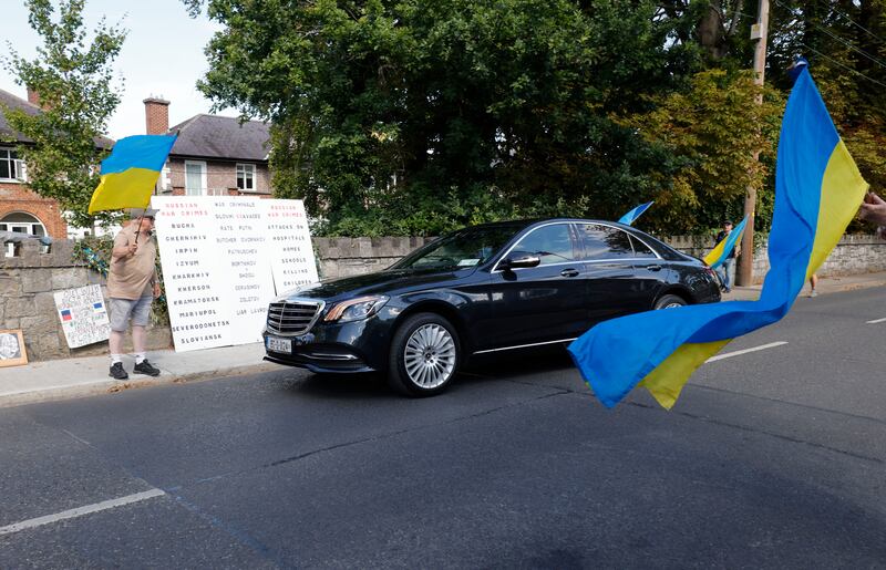 Protesters in support of Ukraine shout at a car believed to be carrying the Russian ambassador to Ireland Yuri Filatov. Photograph: Alan Betson