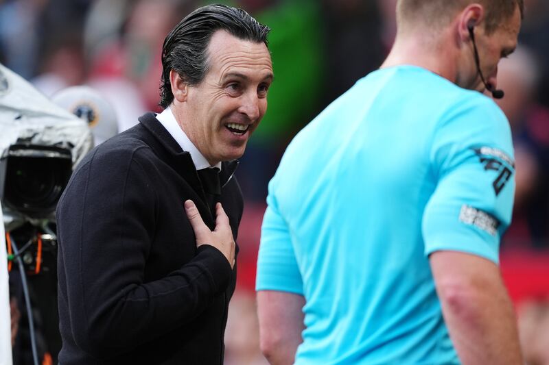 Aston Villa manager Unai Emery speaks to referee Thomas Bramall after Sunday's match at Old Trafford. Photograph: Martin Rickett/PA