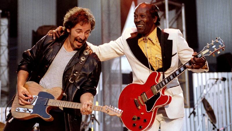 Bruce Springsteen and Chuck Berry perform ‘Johnny B. Good’ in 1995 at Cleveland Stadium. Photograph: Reuters