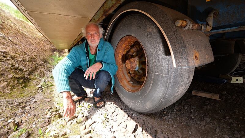 locals in West Kerry finding it almost impossible to get planning permission now in the west Kerry Gaeltacht area . Musician Breanndán O Beaglaoich built his house on a truck , He can take it from one location too another if he wishes .  Breanndán  O Beaglaoich and his passive tigín on wheels in sits on a plot of land in Baile na bPoc, about 15 km west of Dingle - . Kerry County Council have asked him to move his home off the site .    He can also be contacted through his son Conchubhair's number today on 087 4123824.Photo By : Domnick Walsh ©  Eye Focus LTD © Tralee Co Kerry Ireland Phone  Mobile 087 / 2672033L/Line 066 71 22 981 E/mail - info@dwalshphoto.ie       www.dwalshphoto.com