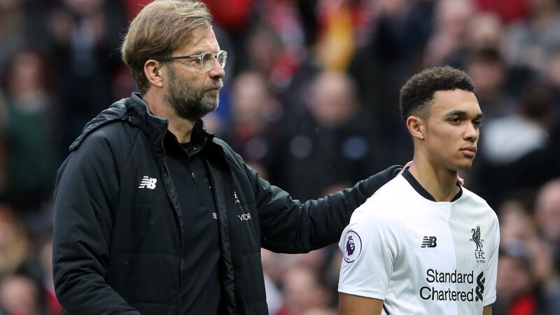 Liverpool manager Jürgen Klopp consoles Trent Alexander-Arnold after his team’s defeat. Photograph: PA
