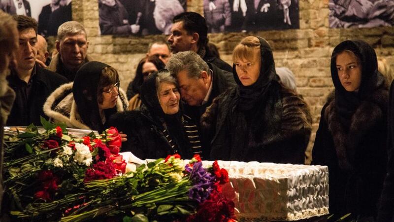 Members of Boris Nemtsov’s family  near his coffin  during a farewell ceremony on March 3rd, 2015 in Moscow, Russia. Photograph: Alexander Aksakov/Getty Images