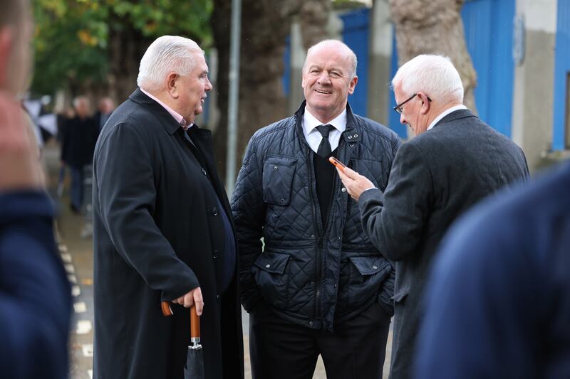 Kerry footballer Jack O’Shea with former Armagh player and manager Joe Kernan, (left) at the funeral of former Dublin Gaelic footballer Brian Mullins at St Vincent de Paul Church, Griffith Avenue, Dublin.  Photograph: Dara Mac Dónaill / The Irish Times










