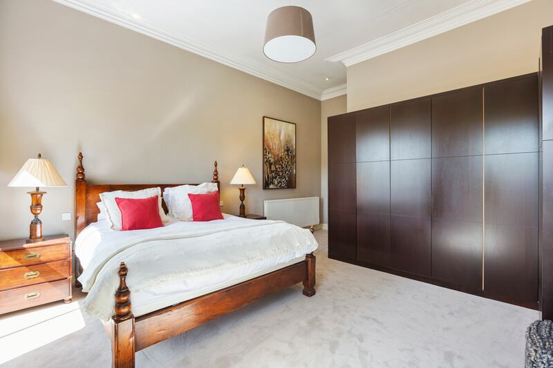 The en suite principal bedroom is located on the top floor