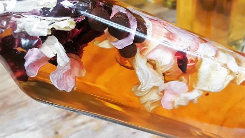 Oil infused with flowers and berries.
