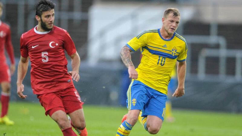 Turkey’s Hakan Cinemre (left) and Sweden’s John Guidetti fight for the ball during a Uefa European Under-21 qualifier. The Swede has completed a loan move to Celtic from Manchester City.  Photograph: Bjorn Lindgren/EPA