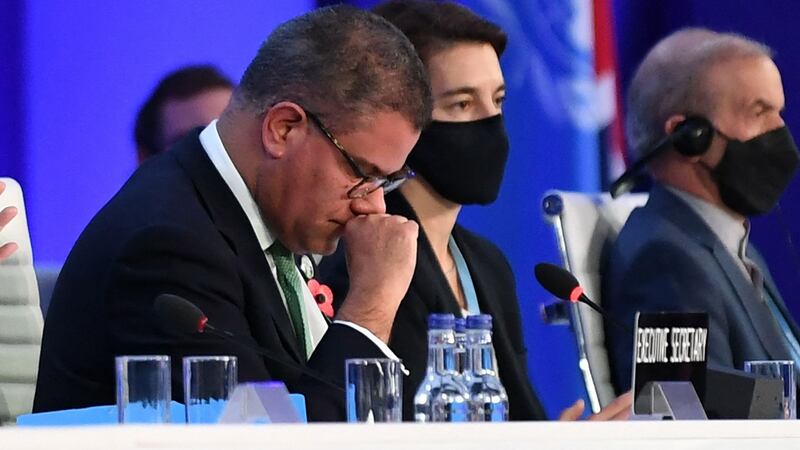 Britain’s president for Cop26 Alok Sharma reacts as he makes his concluding remarks during the UN Climate Change Conference in Glasgow. Photograph: Paul Ellis/AFP via Getty