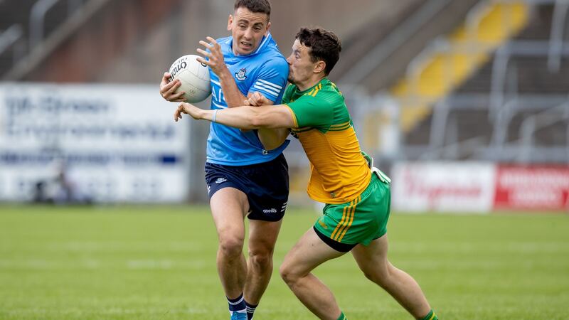 Donegal’s Caolan McGonigle challenges  Cormac Costello of Dublin during the Allianz Football League Division One  semi-final at  Kingspan Breffni Park. Photograph: Morgan Treacy/Inpho