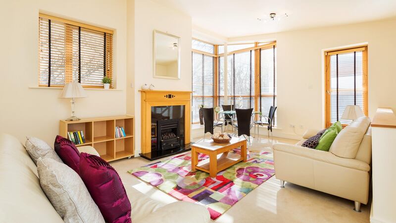 The large open-plan living/diningroom has average ceiling heights of  about 3m, with light streaming in on three sides.