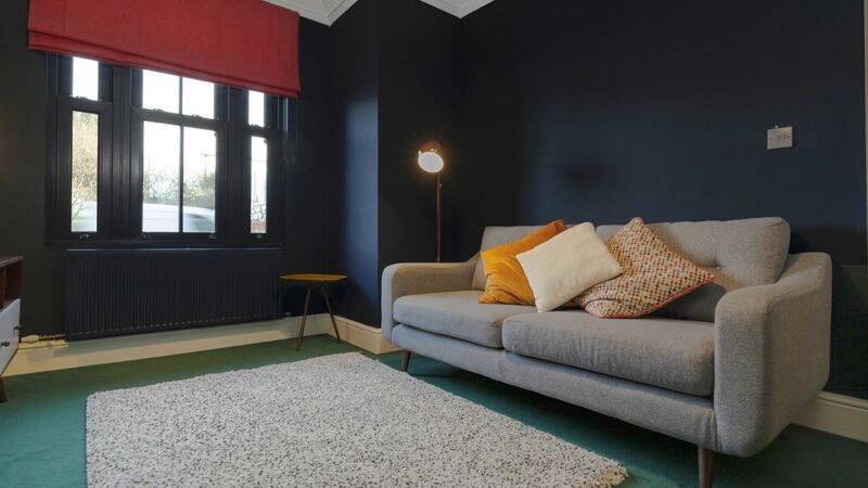 The living room in 46 East Wall Road has a contemporary design