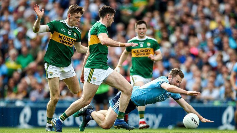 Jack McCaffrey scraps for the ball with Kerry’s Paul Geaney and Gavin White. Photograph: James Crombie/Inpho