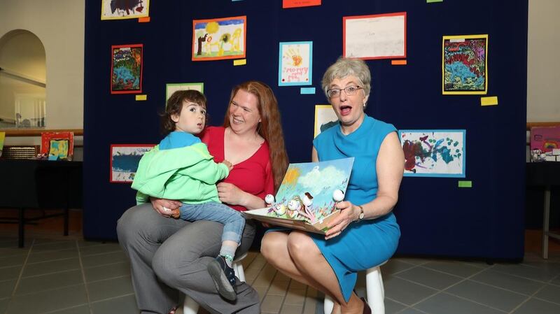 Arta Runika and her son Emmett (2) with the Minister for Children and Youth Affairs Katherine Zappone at a recent Tusla conference in Dublin on family support