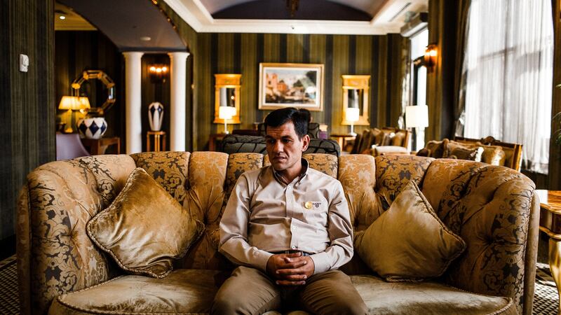 Abdullah Kurdi pictured in the piano bar of a hotel in Irbil, in Iraq’s Kurdistan region, less than a month after losing his wife and two sons in an attempt to reach Greece. “I have become a shadow,” he said. Photograph: Bryan Denton/The New York Times