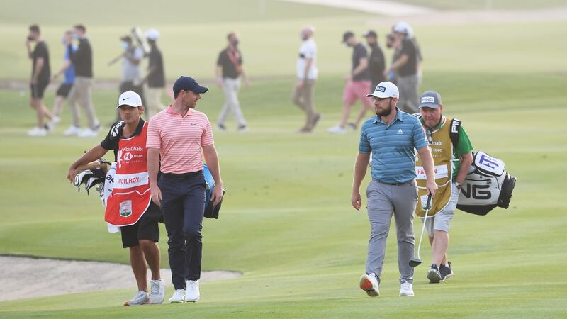 Rory McIlroy leads Tyrrell Hatton by one in Abu Dhabi. Photograph: Ross Kinnaird/Getty