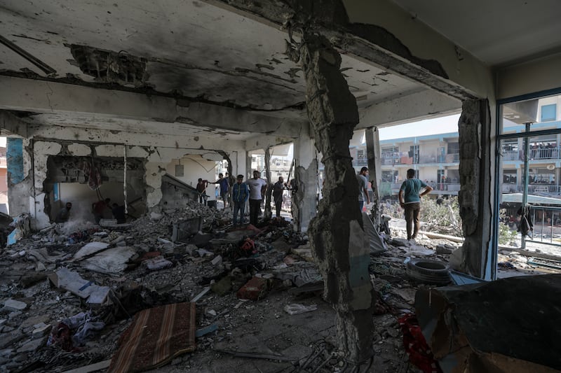 Palestinians inspect a destroyed school following an Israeli air strike in Al Nusairat refugee camp in the central Gaza Strip - June 6th, 2024. Photograph: Mohammed Saber/EPA