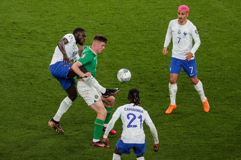 Ireland's Evan Ferguson holds the ball up for his team. Photograph: Ben Brady/Inpho
