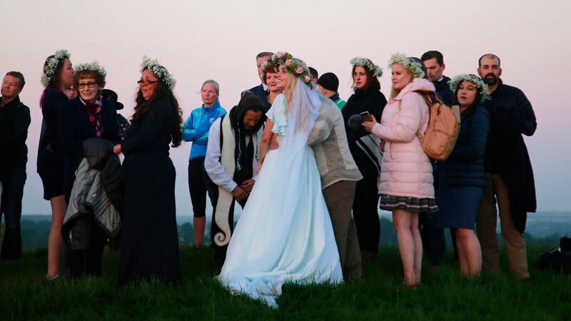 Jeff Olsen and Anna Lisa Van Bloem from Utah celebrate their marriage on the Hill of Tara. Photograph Nick Bradshaw/The Irish Times