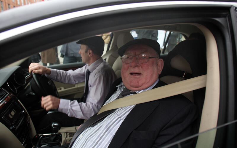 Jackie Healy-Rae leaving Leinster House with his son Michael in January 2011. Photo: Eric Luke / THE IRISH TIMES 