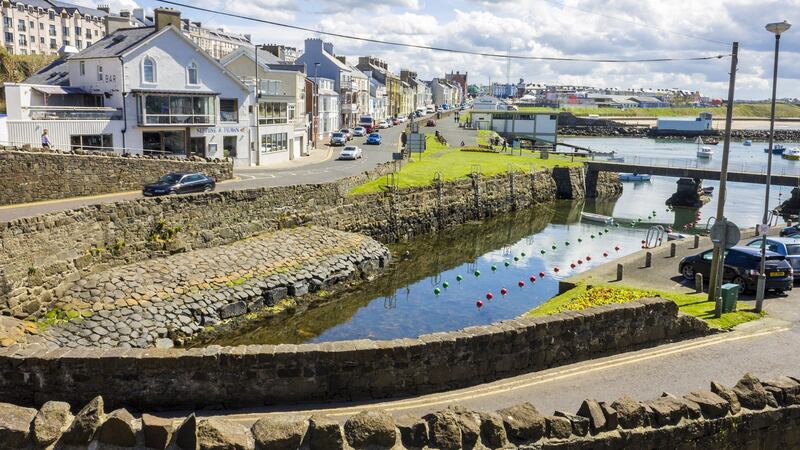 The harbour in Portrush, Co Antrim: With two beaches – East and West Strand – The Port is always busy in summer. Photograph: iStock