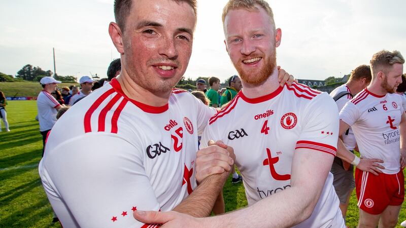 Tyrone’s Ronan O’Neill and Hugh Pat McGeary celebrate after the game. Photograph: Morgan Treacy/Inpho