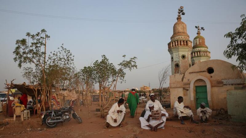 Some Syrians are travelling through Sudan, one of the few countries they don’t need a visa for, on their way back to Syria. These men are near Khartoum. Photograph: Sally Hayden