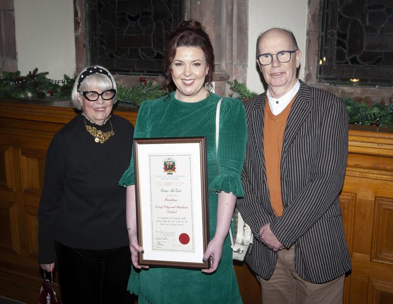 Derry City and Strabane District Council photo of Lisa McGee with her parents Ann and Chris after being awarded the Freedom of Derry, making her the first woman to receive the award, in December 2022. Photograph: PA