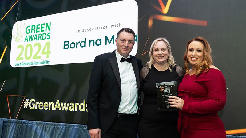Louise Carrick, head of marketing and customer experience at Calor, presents the green food and beverage award to Philip Meade and Eleanor Meade, Meade Farm