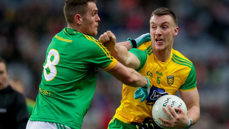 Donegal’s Leo McLoone and Bryan Menton of Meath. Photograph: Oisin Keniry/Inpho