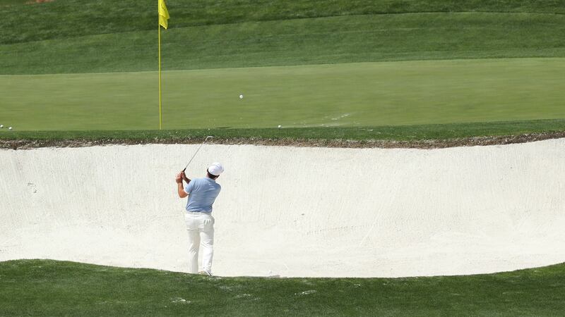 Francesco Molinari plays a shot from a bunker during a practice round. Photo: David Cannon/Getty Images