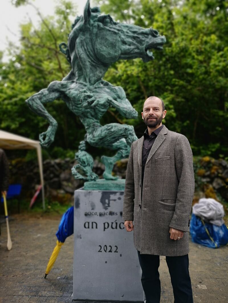 Sculptor Aidan Harte with his Púca statue at the unveiling in Carron, Co Clare