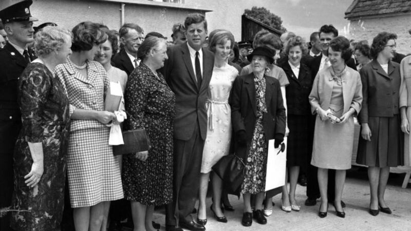 John F Kennedy poses with relatives in Dunganstown, Co Wexford, on his visit to Ireland in 1963