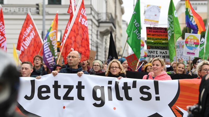 Natascha Kohnen, centre, frontrunner of the SPD in Bavaria, and Katharina Schulze, right, frontrunner of the Green Party in Bavaria. Photograph: Andreas Gebert/Getty Images