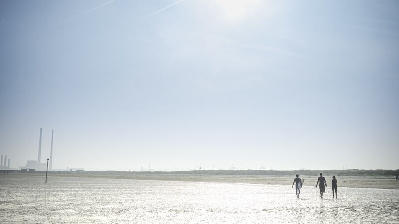 Stand up paddle boarders at the Dollymount Beach in Dublin