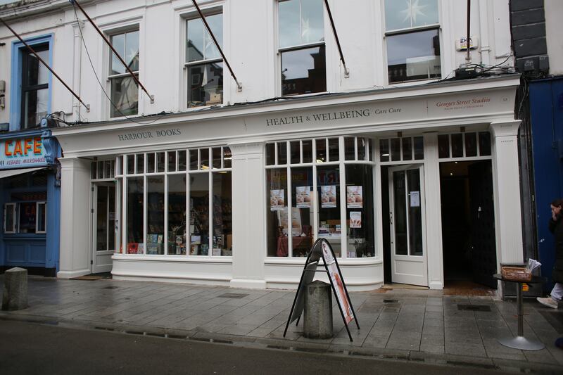 The newly redesigned shopfront for three businesses on George's Street Lower: Harbour Books, the Health & Wellbeing store and George's Street Studios. Photograph: Bryan O’Brien