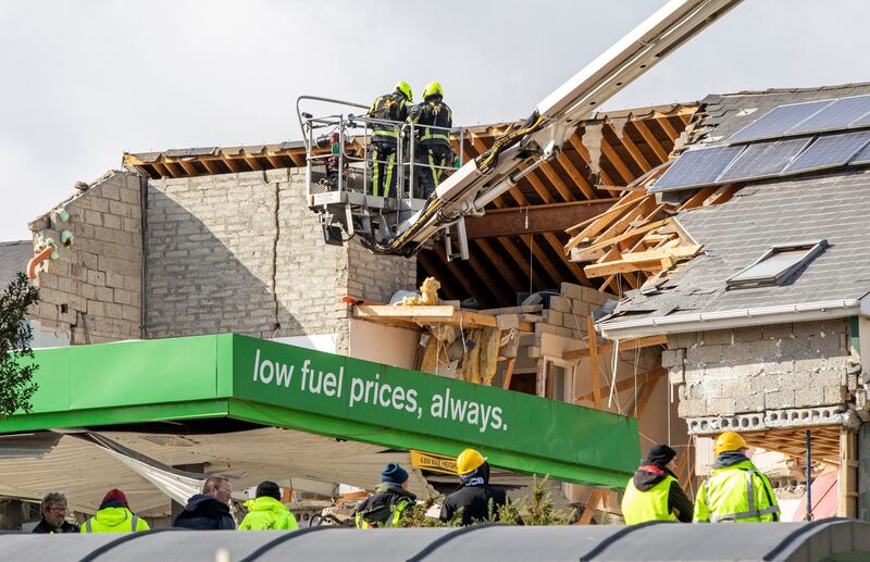 The wreckage following the explosion. Those who lived in the apartment complex behind the petrol station have been temporarily rehoused. Photograph: Paul Faith/AFP via Getty Images