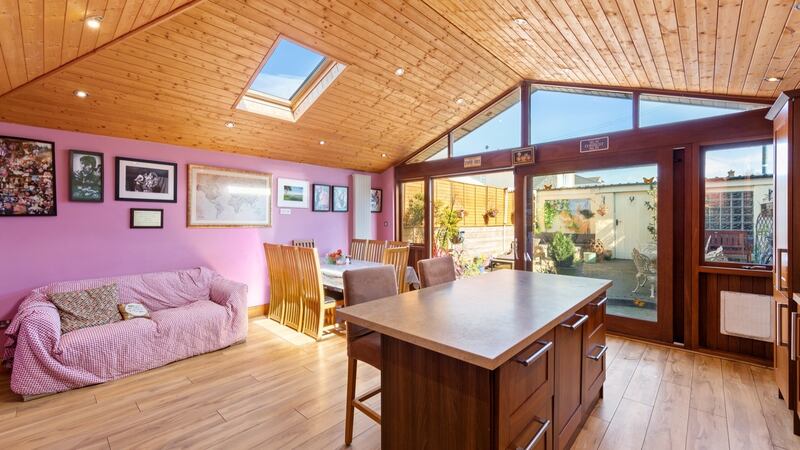 The open-plan kitchen-dining and living area.