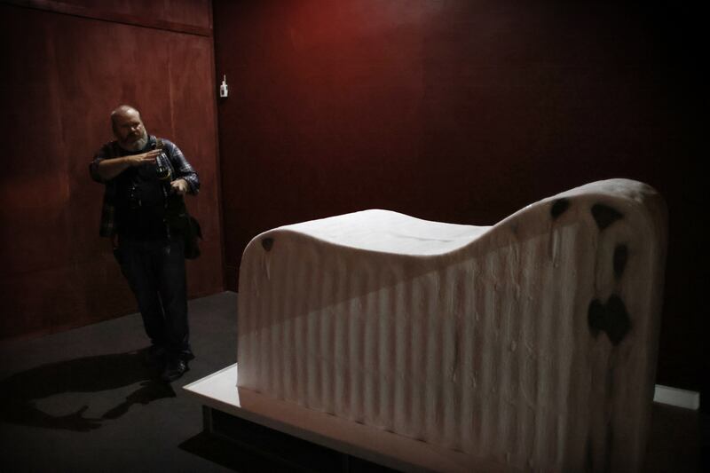 Barry Kehoe with Mnemosyne, 2002, by Alice Maher in the IMMA gallery space. Photograph: Bryan O’Brien