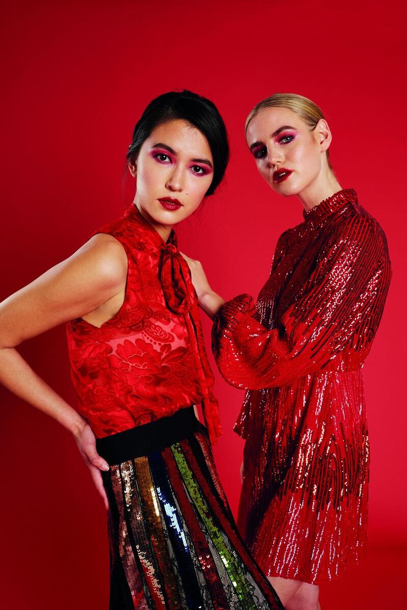 Paint the town red: Li-Ann wears skirt, €770, and top, €275, both Alice + Olivia. Vanessa wears dress, €365, Rixo London