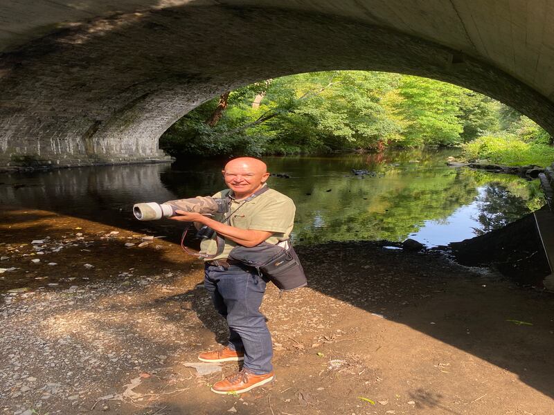 Declan Tarpey standing in front of the river Dodder. Photograph: Cian O'Connell