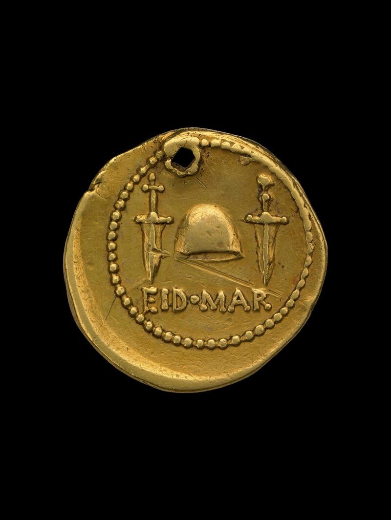 Ides of March coin from 43-42 BC, a gold aureus commemorating the assassination of Julius Caesar. The reverse shows the daggers with which  Caesar was murdered and a cap of liberty to symbolise the liberation of Rome from Caesar’s rule. Photograph:  Trustees of the British Museum